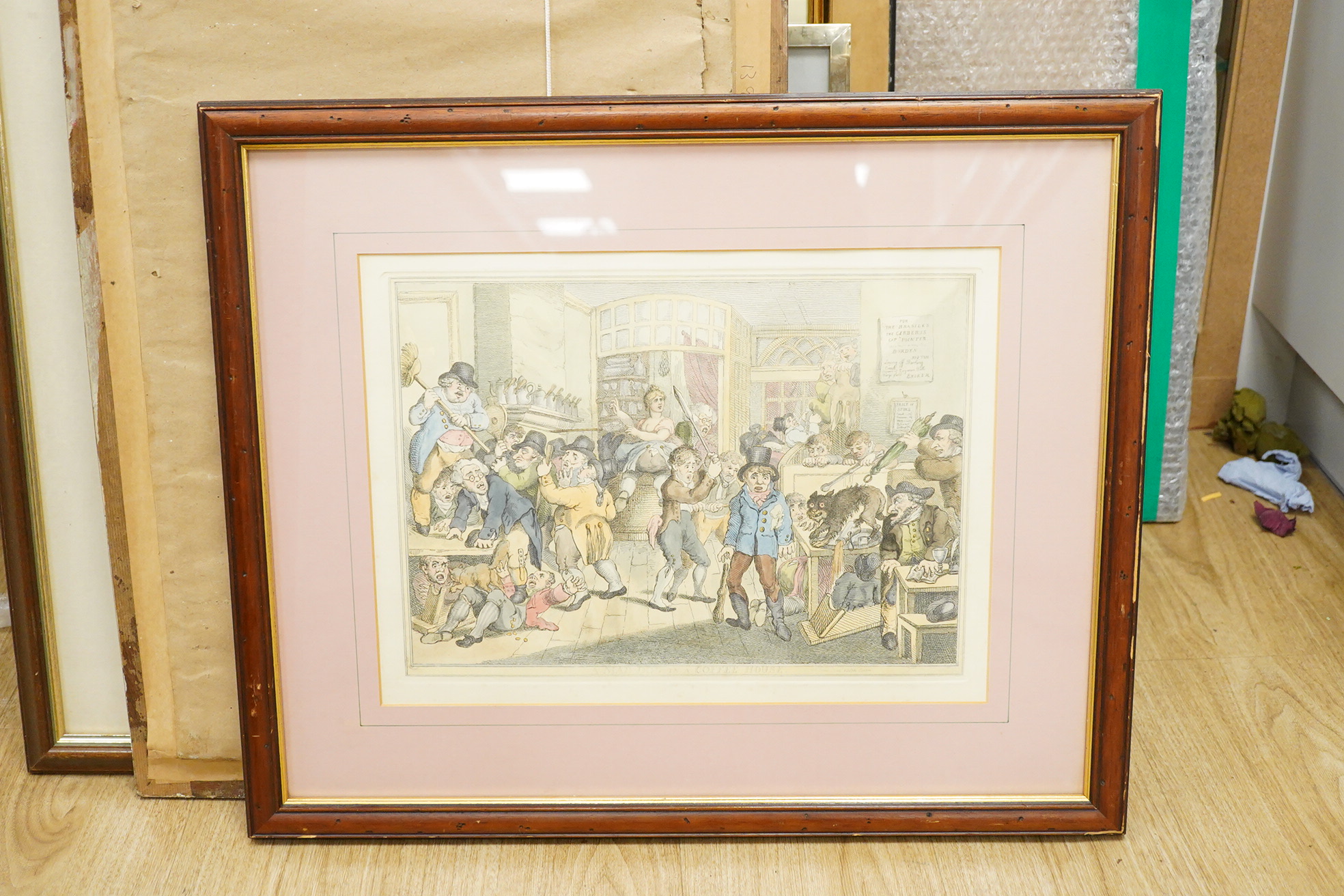 Four satirical etchings and prints to include two after Thomas Rowlandson (1756-1827), 'A Mad Dog in a Coffee House’ and ‘Throwing a Light on the Dark Deeds of the Pensioners’, largest 31 x 42cm